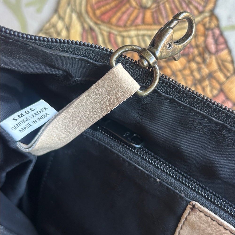 Anuschka hand-painted genuine leather bag featuring floral lotus artwork. - Picture 11 of 12